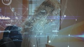 Woman tapping tablet in office and causing network graphics while second woman joining data review. Collaboration, teamwork, digital, technology, innovation, communication, modern - Powered by Shutterstock - Get 15% off with code: PIKWIZARD15