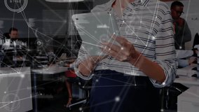 Woman raising tablet and tapping screen activating data graphs in business office reviewing data. Technology, collaboration, innovation, analytics, communication, digital, workspace - Powered by Shutterstock - Get 15% off with code: PIKWIZARD15