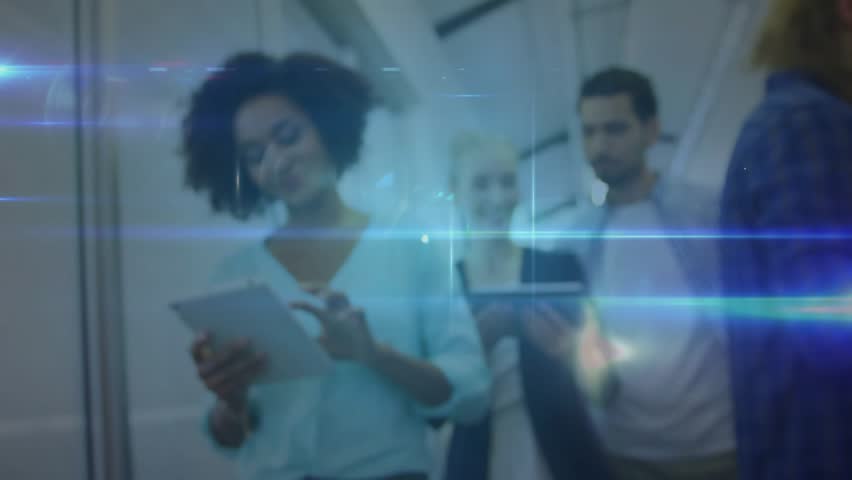 Team walking tapping devices and starting digital network overlay illustrating technology links. Technology, connectivity, collaboration, innovation, digital, modern, workspace - Powered by Shutterstock - Get 15% off with code: PIKWIZARD15