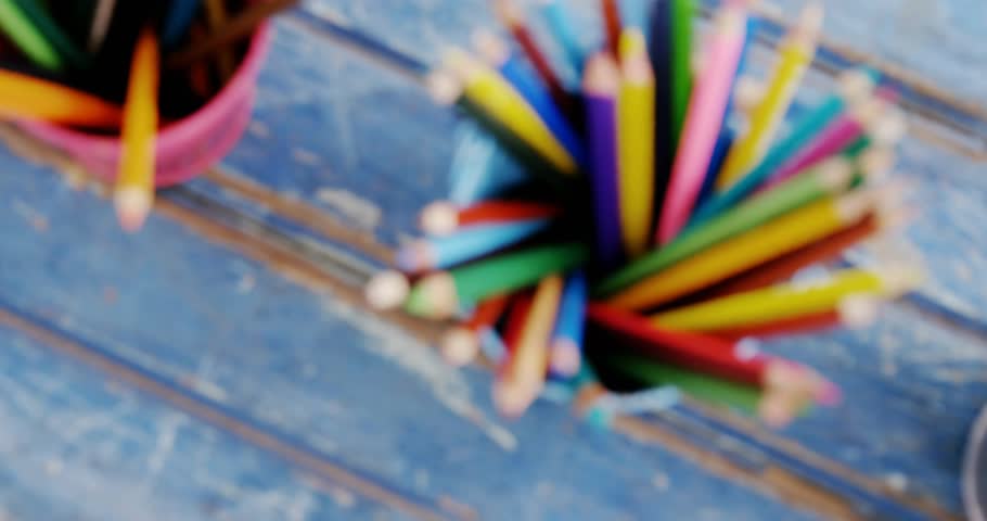 Blur clearing triggers pencil holders remaining still while calculus formulas animating tableau. Creative, educational, minimalistic, illustrative, scientific, geometric, colorful