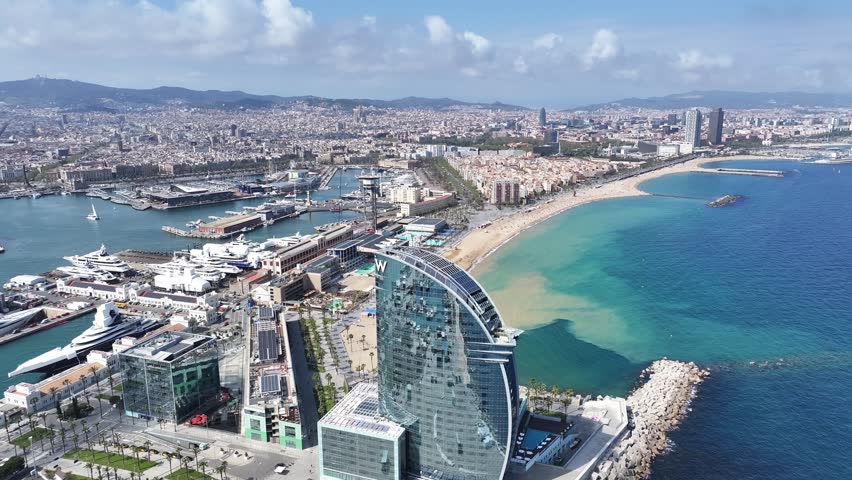W Barcelona Hotel At Barcelona In Barcelona Province Spain. Stunning Cityscape. Beach Landscape. Highrise Buildings. W Barcelona Hotel in Spain. Nature Background. Spain Skyline.