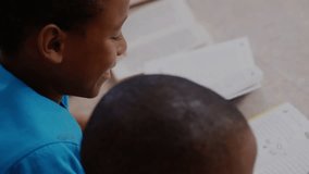 Boy and girl reading activating network icons clustering around heads showing educational link. Learning, education, social, connectivity, focus, interaction, development - Powered by Shutterstock - Get 15% off with code: PIKWIZARD15