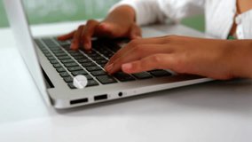 Female student pressing laptop key animating interconnected user icons spreading for e-learning. Educational, technology, connectivity, innovation, digital, focused, modern - Powered by Shutterstock - Get 15% off with code: PIKWIZARD15