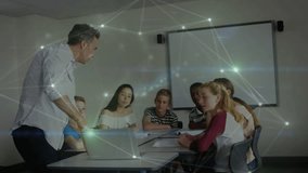 Teacher opening laptop in classroom guiding students through lesson with pulsing network overlays. Education, mentorship, innovation, collaboration, digital, classroom, learning - Powered by Shutterstock - Get 15% off with code: PIKWIZARD15