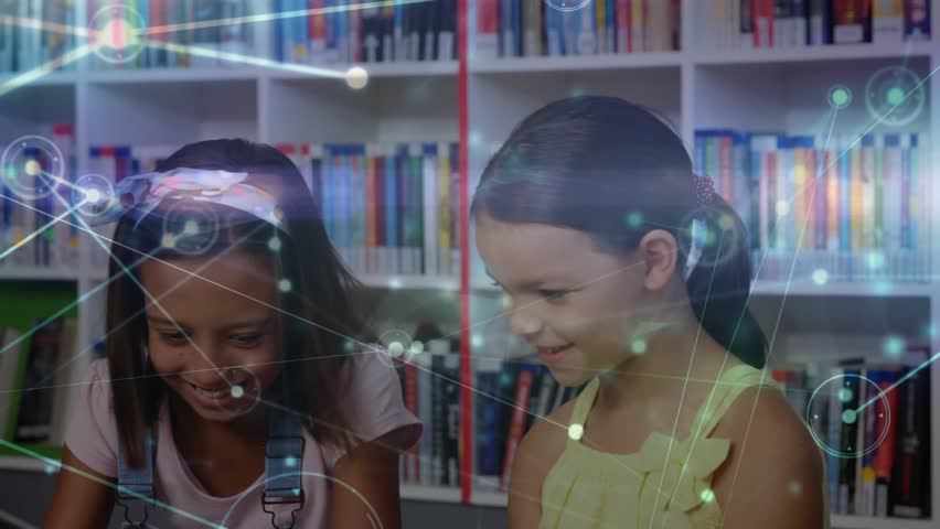 Girls tapping tablets in library while network overlay fading in sparking collaborative learning. Children, education, collaboration, technology, library, learning, digital - Powered by Shutterstock - Get 15% off with code: PIKWIZARD15