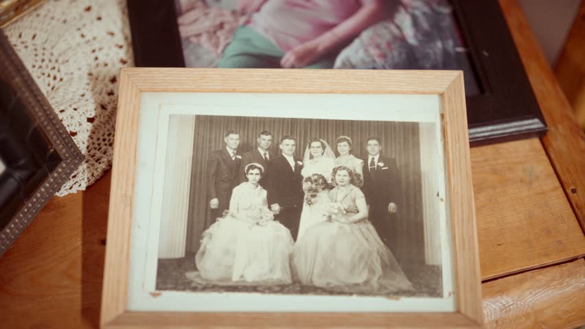 Toronto , Ontario , Canada - 10 02 2025: Vintage black and white family wedding portrait displayed in wooden picture frame