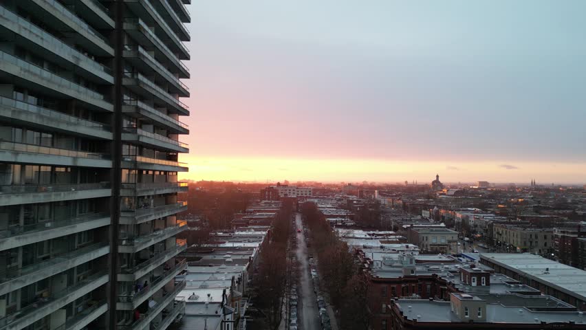 Montréal rainy sunset with Parc avenue neighborhood in drone view.