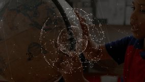 Digital mesh materializing above globe boy spinning globe for education and watching overlay rotate. Interactive, educational, futuristic, innovative, youthful, discovery, technology - Powered by Shutterstock - Get 15% off with code: PIKWIZARD15