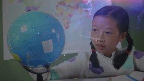 Girl at desk spinning globe causing animated network arcs showing education connections worldwide. Education, technology, connectivity, learning, exploration, innovation, classroom - Powered by Shutterstock - Get 15% off with code: PIKWIZARD15