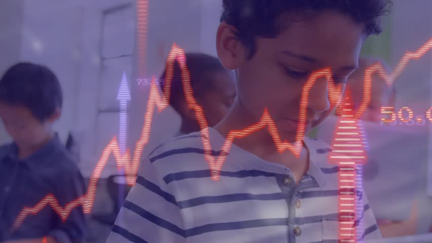 Child boy tapping tablet screen in classroom activating red finance graphs over peers laptops. Learning, technology, education, digital, collaboration, analytics, innovation - Powered by Shutterstock - Get 15% off with code: PIKWIZARD15