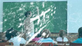 Teacher writing equations on chalkboard while digital overlay forming lock icon in education. Education, classroom, technology, digital, security, learning, innovation - Powered by Shutterstock - Get 15% off with code: PIKWIZARD15