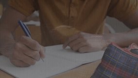 Male student leaning and starting writing with blue pen analyzing floating binary code in education. Technology, education, concentration, innovation, learning, digital, youth - Powered by Shutterstock - Get 15% off with code: PIKWIZARD15