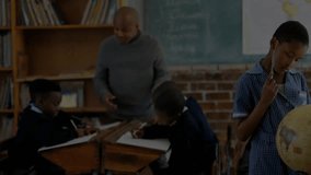 Education teacher gesturing toward students, creating network icons linking globe and desks. Learning, mentorship, collaboration, digital, innovation, knowledge, technology - Powered by Shutterstock - Get 15% off with code: PIKWIZARD15