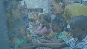 Teacher entering school lab and moving down row, guiding students typing keyboards for education. Learning, mentorship, technology, focus, concentration, guidance, education - Powered by Shutterstock - Get 15% off with code: PIKWIZARD15