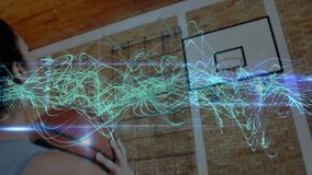 Teenager shooting basketball during gym practice, activating technology wave pulsing along ball arc. Sports, teamwork, activity, energetic, digital, youth, recreation - Powered by Shutterstock - Get 15% off with code: PIKWIZARD15