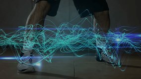 male athlete starting crossover dribble for sports training with neon waveform flowing around legs. Sports, exercise, motion, digital, athleticism, performance, training - Powered by Shutterstock - Get 15% off with code: PIKWIZARD15