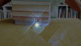 Child placing book stack and beaming into camera with sparkle overlay celebrating education. Child, reading, library, education, sparkle, cheerful, home - Powered by Shutterstock - Get 15% off with code: PIKWIZARD15