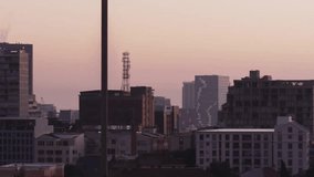 While dusk settling HUD elements fading in, sliding and stabilizing for analytics on city skyline. Urban, digital, modern, technology, skyline, data, analytics - Powered by Shutterstock - Get 15% off with code: PIKWIZARD15