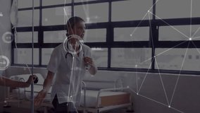 Nurses gripping stethoscopes and walking corridor while digital overlay activating patient data. Healthcare, teamwork, professionalism, modern, technology, hospital, collaboration - Powered by Shutterstock - Get 15% off with code: PIKWIZARD15