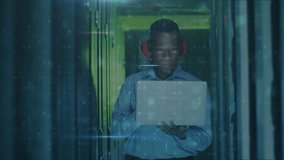 IT security engineer initiating scan on laptop and monitoring rising malware alerts in server aisle. Cybersecurity, technology, network, data, protection, digital, surveillance - Powered by Shutterstock - Get 15% off with code: PIKWIZARD15