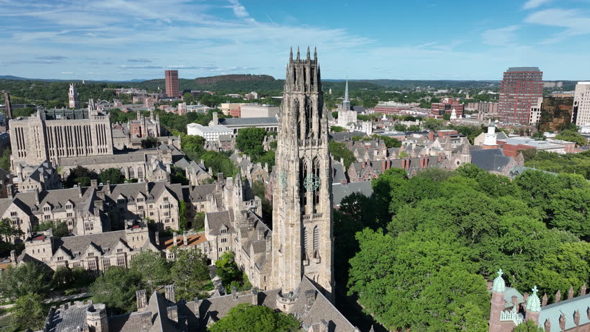 Exterior View Of Harkness Tower With Clock In Yale University Old Campus In New Haven, Connecticut, USA. - aerial shot