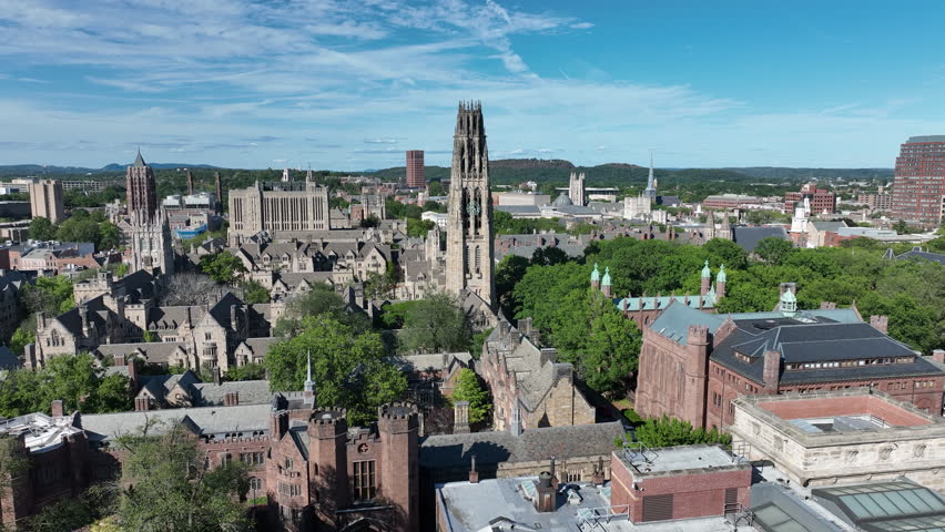 Flying Towards The Harkness Tower And Yale University Old Campus With Gothic Architecture In New Haven, Connecticut, USA. - aerial shot