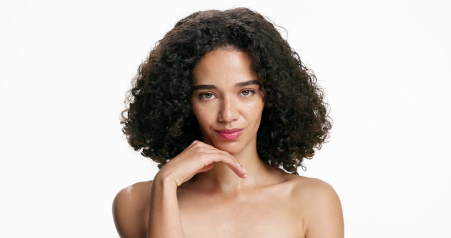 Face, confident and woman with smooth skin, studio and skincare for dermatology benefits or wellness. White background, mockup space and person with pride for glow, health and cosmetics for hydration