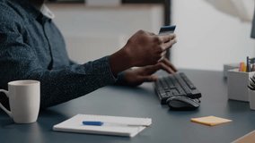 Close-up of hands typing credit card info on a keyboard, illustrating online payment, e-commerce, digital transactions, and cybersecurity. - Powered by Shutterstock - Get 15% off with code: PIKWIZARD15