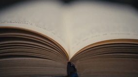 Close-up of flipping pages on an old book, highlighting literature, knowledge, history, reading, and vintage or antique book aesthetics. - Powered by Shutterstock - Get 15% off with code: PIKWIZARD15