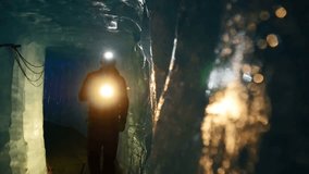 Male explorer discovering ice inside a glacier cave tunnel, holding a flashlight, showcasing adventure, exploration, nature, and extreme outdoor activities. - Powered by Shutterstock - Get 15% off with code: PIKWIZARD15