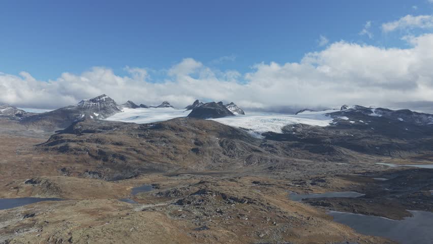 A drone footage from Jotunheimen National Park, you can also glimpse ancient glaciers amidst the autumn landscape