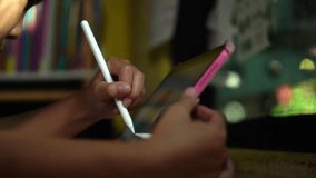 A young girl using a digital tablet for online learning and studying at home. The image represents modern education, technology in childhood, and the digital lifestyle of students. Perfect for illustr - Powered by Shutterstock - Get 15% off with code: PIKWIZARD15
