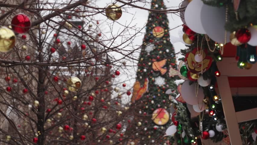 Christmas fair, decorated stalls selling gifts, December vacation atmosphere. 