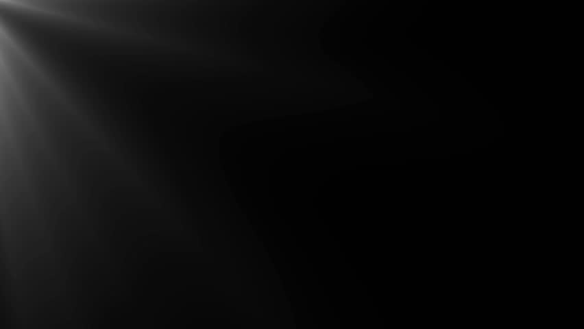White volumetric light rays shine from the top left corner. Seamless loop for creating a cinematic, heavenly, or stage lighting effect. Use with screen or add blend modes for overlay