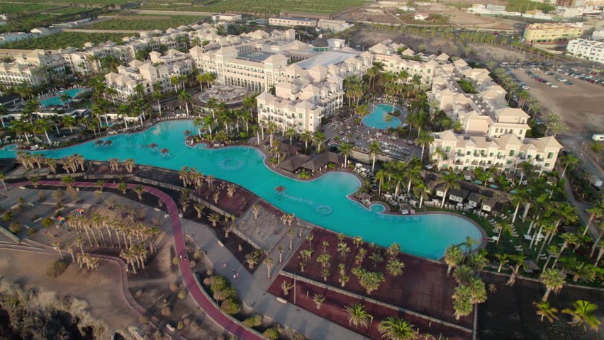 Infinity Pool Of Gran Melia Palacio de Isora, 5-star Hotel In Alcala, Tenerife, Canary Islands, Spain. - aerial shot