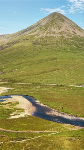 Explore the breathtaking landscapes of Isle of Skye in Scotland with stunning aerial views of mountains and rivers