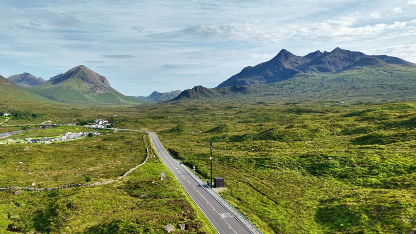 Explore the breathtaking aerial views of Isle of Skye in Scotland revealing stunning landscapes and majestic mountains