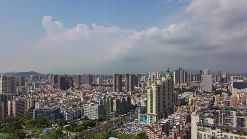 Aerial view of Shenzhen urban skyline with mixed residential and commercial buildings, featuring Tianhong Plaza and modern city development in China