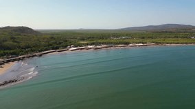 Aerial panoramic view advancing towards Las Islitas Beach in Nayarit, with ocean and beach views - Powered by Shutterstock - Get 15% off with code: PIKWIZARD15
