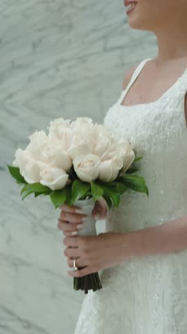 Luxury fashion bride in a white dress.Young woman with beautiful hairstyle and makeup.