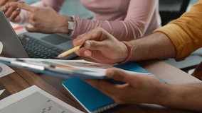Business informal team brainstorming in office. Multiracial Arabian businessman talking happy Caucasian woman showing diagram stats carefree diversity colleagues discuss financial plan idea sharing - Powered by Shutterstock - Get 15% off with code: PIKWIZARD15