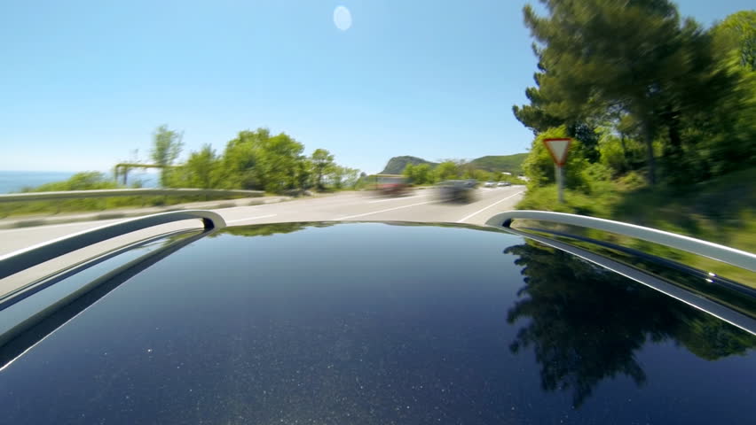 Timelapse view of car on the speed at the beautiful road with mountains. pov 