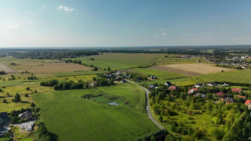 Aerial View of a Picturesque European Village with Traditional Houses and Green Fields. Poland, Lower Silesia
