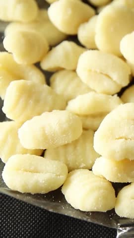 Gnocchi raw potato dough snack fresh delicious gourmet food background on the table  rustic food top view copy space vegetarian food
