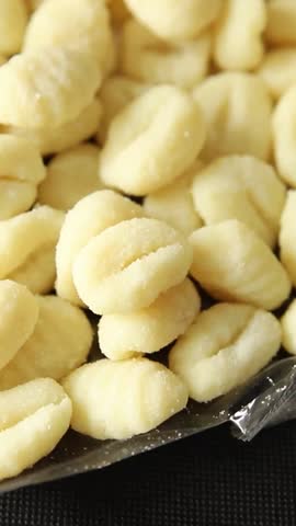 Gnocchi raw potato dough snack fresh delicious gourmet food background on the table  rustic food top view copy space vegetarian food