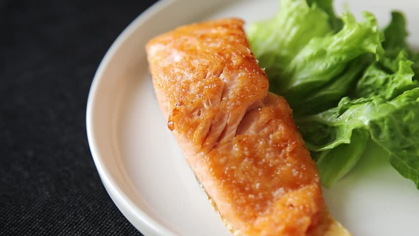Salmon fried fish seafood second course tasty snack fresh delicious gourmet food background on the table rustic top view copy space pescetarian diet