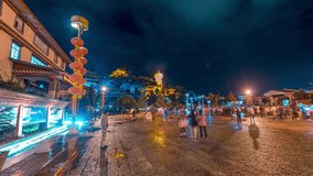 Traditional Asian architecture plaza illuminated at night with red lanterns, creating a magical moonlight atmosphere with tourists exploring the extensive cultural heritage site. - Powered by Shutterstock - Get 15% off with code: PIKWIZARD15