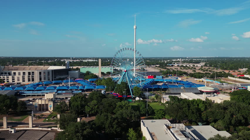 Texas State Fair Park in Dallas with ferris wheel. 