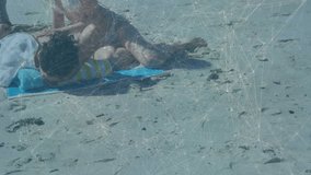 Woman nudging shoulder initiating back massaging on striped towel with couple relaxing beach spa. Beach, relaxation, couple, massage, leisure, sunny, coastal - Powered by Shutterstock - Get 15% off with code: PIKWIZARD15