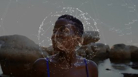 Network sphere overlaying woman wading in water causing head tilting and showing tech connectivity. Technology, connectivity, digital, innovation, serenity, nature, futurism - Powered by Shutterstock - Get 15% off with code: PIKWIZARD15